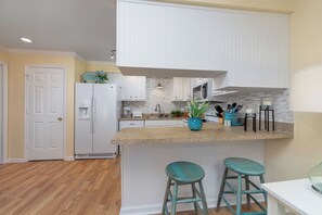 Fridge, microwave, oven, stovetop - Beach Access - Cozy  2-BD Pet Friendly Kitty Hawk Condo with pool, W&D, tennis (Kitty Hawk)