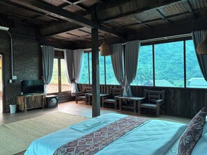 Family Room, River View | Blackout drapes, iron/ironing board, free WiFi