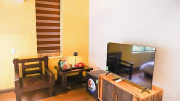 Deluxe Double Room, Garden View | Blackout drapes, iron/ironing board, free WiFi