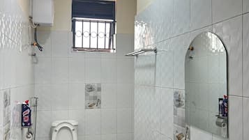 Shower, towels, soap, toilet paper