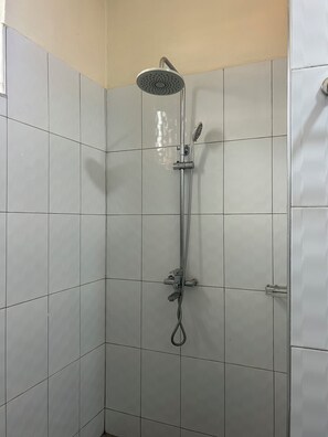 Shower, towels, soap, toilet paper