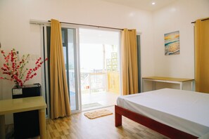 Deluxe Cabin, Balcony, Beach View | Blackout drapes, soundproofing, free WiFi