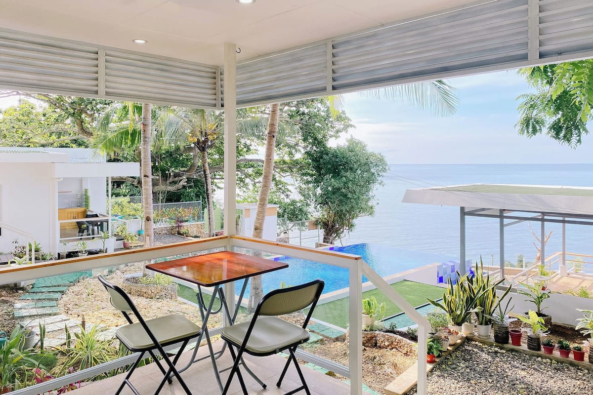 Deluxe Cabin, Balcony, Beach View | Blackout drapes, soundproofing, free WiFi