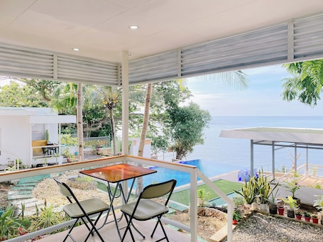 Deluxe Cabin, Balcony, Beach View | Blackout drapes, soundproofing, free WiFi