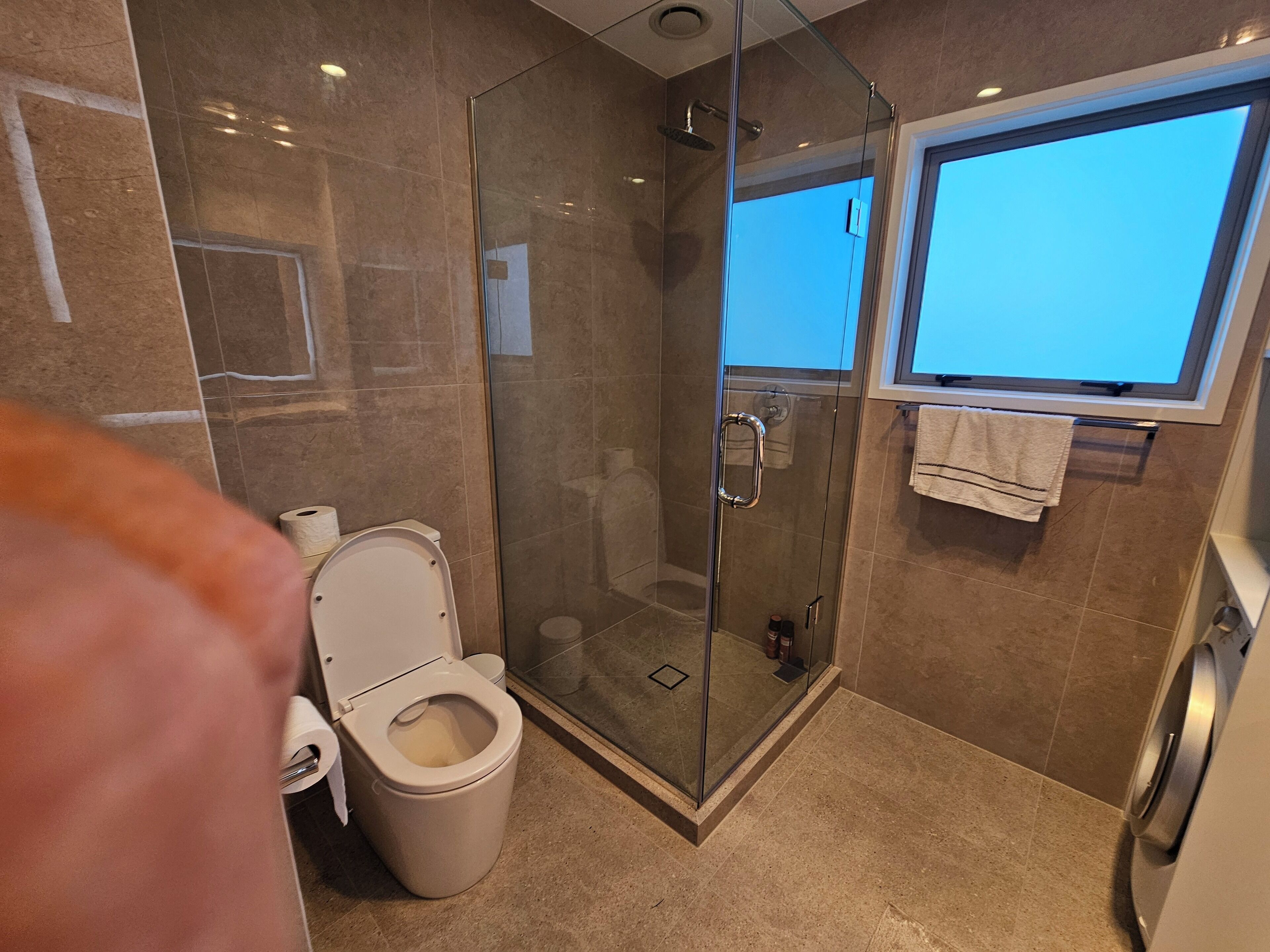 Shower, hair dryer, towels, soap