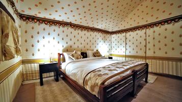 Desk, laptop workspace, blackout drapes, iron/ironing board