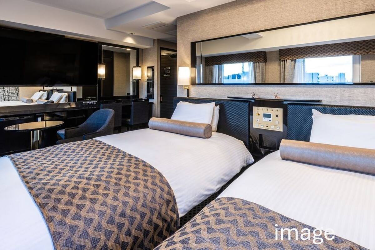 Deluxe Twin Room, Non Smoking | Desk, blackout curtains, free WiFi, bed sheets