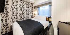 Desk, blackout curtains, free WiFi, bed sheets