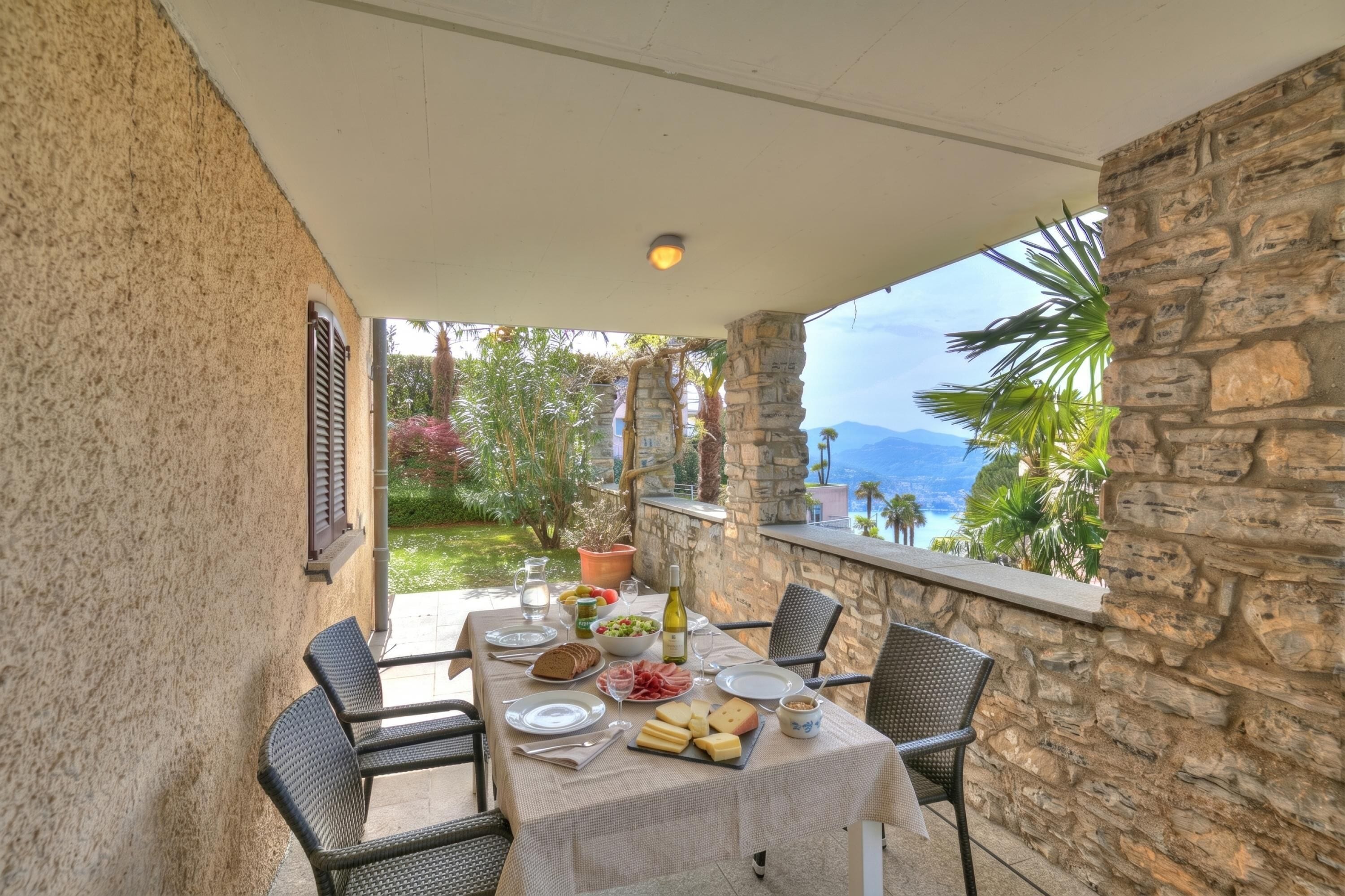 Family Apartment, Multiple Bedrooms, Mountainside (Oasis Panoramic 1BR with shared pool) | Outdoor dining