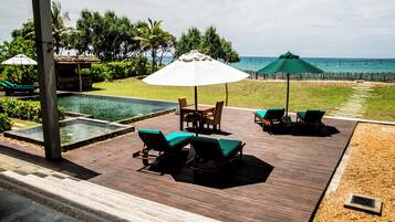 Outdoor pool, pool umbrellas, pool loungers