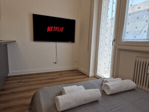 Deluxe Apartment, Balcony | Living area
