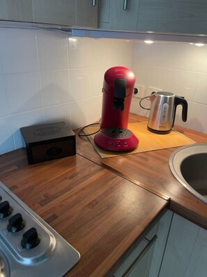 Fridge, microwave, coffee/tea maker, toaster