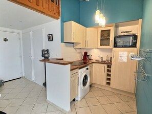 Fridge, microwave, coffee/tea maker, toaster