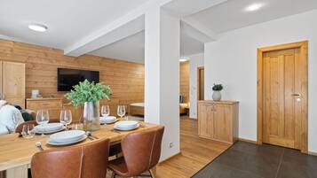 Apartment with Terrace | Living area | 50-inch flat-screen TV with digital channels