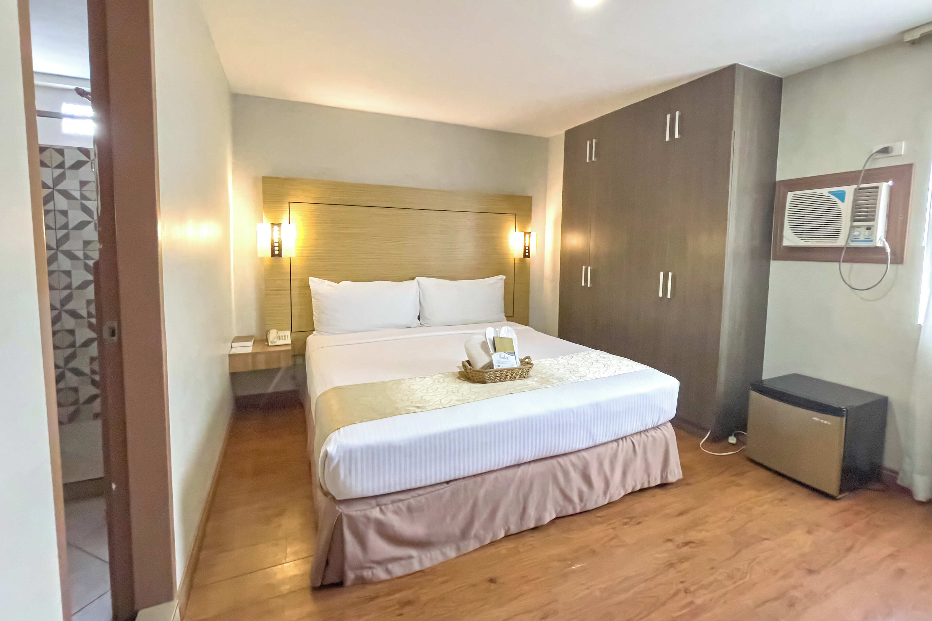 Habitación superior | Escritorio, wifi gratis, ropa de cama