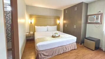 Habitación superior | Escritorio, wifi gratis, ropa de cama