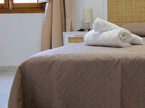 2 dormitoris i roba de llit 