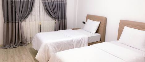 1 slaapkamer, een strijkplank/strijkijzer, wifi, beddengoed