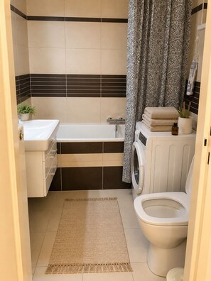 Hair dryer, towels, soap, toilet paper