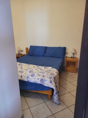 2 habitaciones, tabla de planchar con plancha y internet