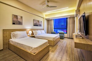 Executive Room, City View | Minibar, desk, free WiFi, bed sheets