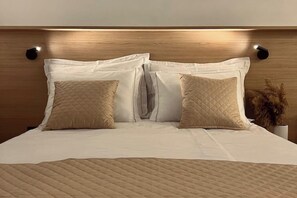 1 habitación, tabla de planchar con plancha, internet y ropa de cama