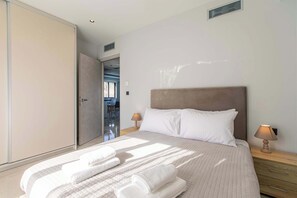 2 bedrooms, in-room safe, iron/ironing board, travel cot