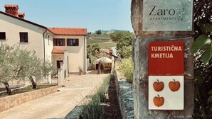 A sign for Zaro Apartments with a red sign indicating tourist accommodation. - Lovely 2-bedroom apartment with terrace & parking (Izola)