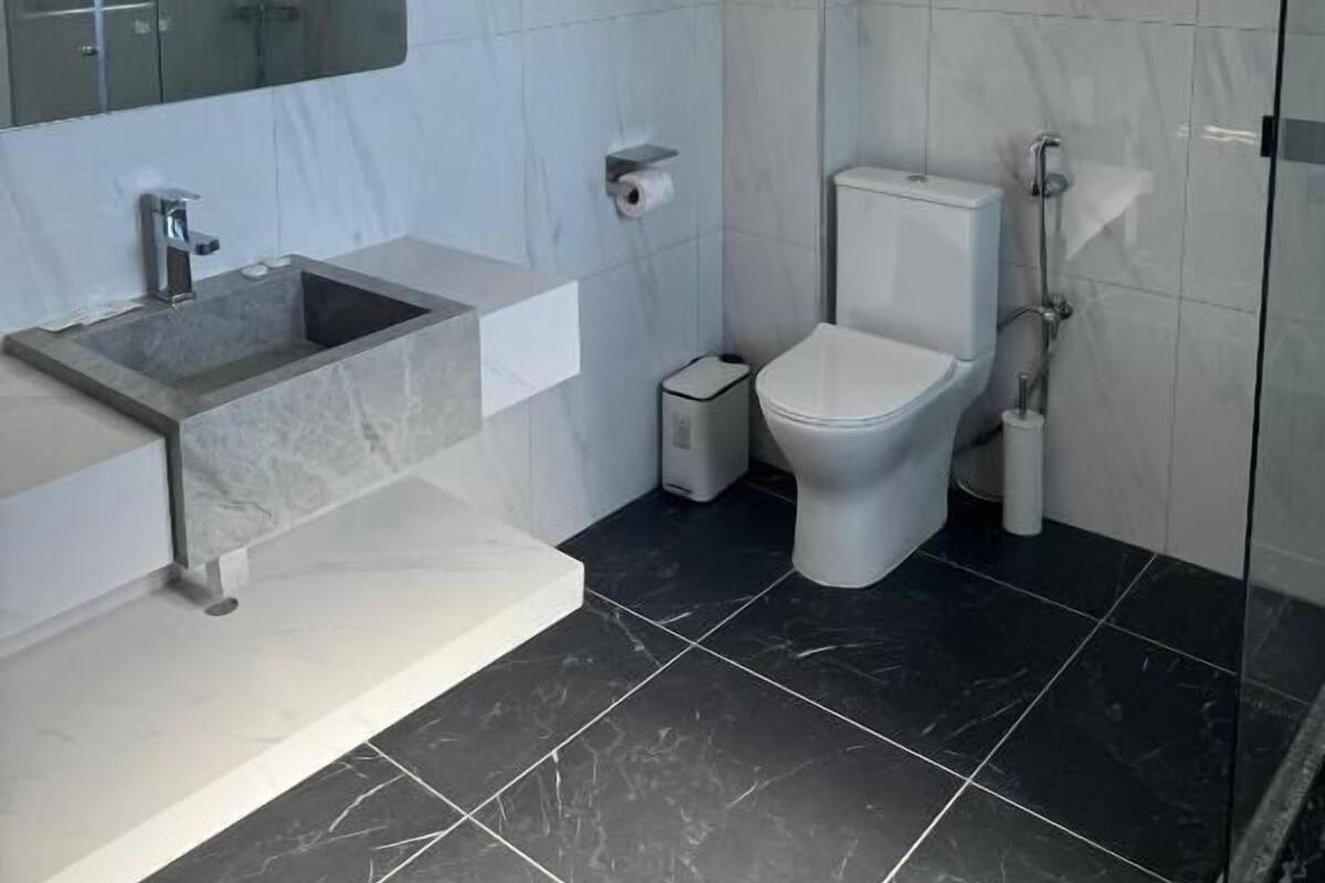 Deluxe Suite | Bathroom | Slippers
