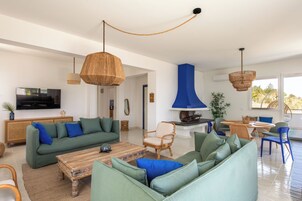 Comfort Apartment, Sea View | Living area | 30-inch TV with satellite channels