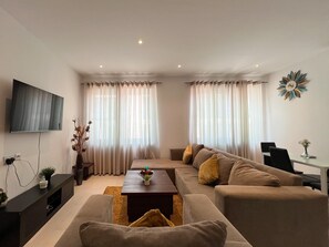 Apartamento, 2 quartos | Área de estar