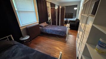 Comfort Quadruple Room | Premium bedding, laptop workspace, free WiFi, bed sheets