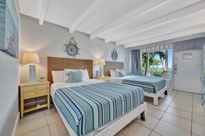 1 bedroom, desk, iron/ironing board, travel crib