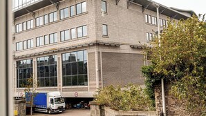 A multi-story building with a modern architectural design, featuring large windows and a flat roof. - Modern 1 Bedroom Flat in Aberdeen City Center, With Parking. (Aberdeen)