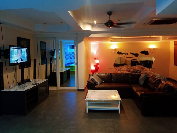 Living room - 75 sqm Studio Type Jacuzzi Apartment 101a (Pattaya)