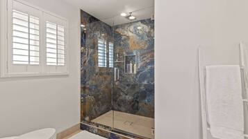 Shower, hair dryer, towels