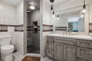 Shower, hair dryer, towels, shampoo