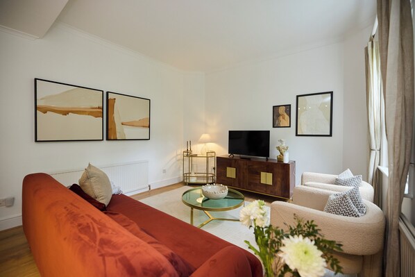 Apartamento, patio | Zona de estar