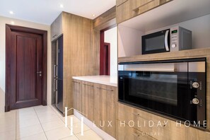 Apartment, Patio, City View | Private kitchen