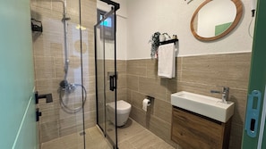 Shower, towels, soap, shampoo