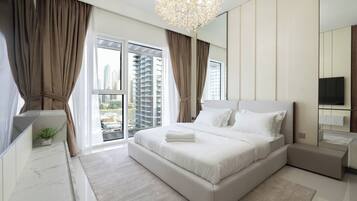 Departamento Deluxe, balcón, vista al mar | Ropa de cama de alta calidad y camas con efecto memoria