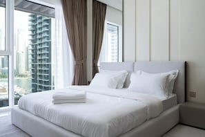 Premium bedding, memory foam beds, in-room safe, blackout drapes