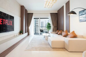 Deluxe Apartment, Balcony, Sea View | Living area