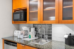 Fridge, microwave, coffee/tea maker, toaster