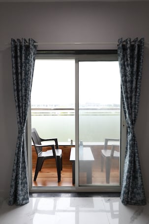 SuĆte premium, sacada, vista para o jardim | Vista da sacada