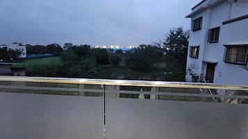 Premium Suite, Balcony, Garden View | Balcony view