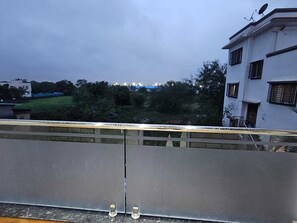 Deluxe Suite, Balcony, Garden View | Balcony view