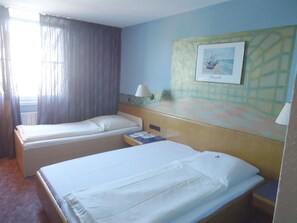 Classic Twin Room, City View | Blackout curtains, soundproofing, iron/ironing board, WiFi - enjoyHotel garni Korntal Stuttgart  (Korntal-Munchigan)