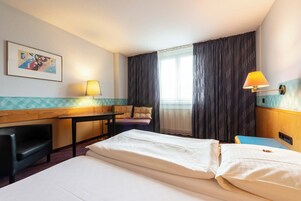 Habitación individual superior, vistas a la ciudad | Cortinas opacas y sistema de insonorización