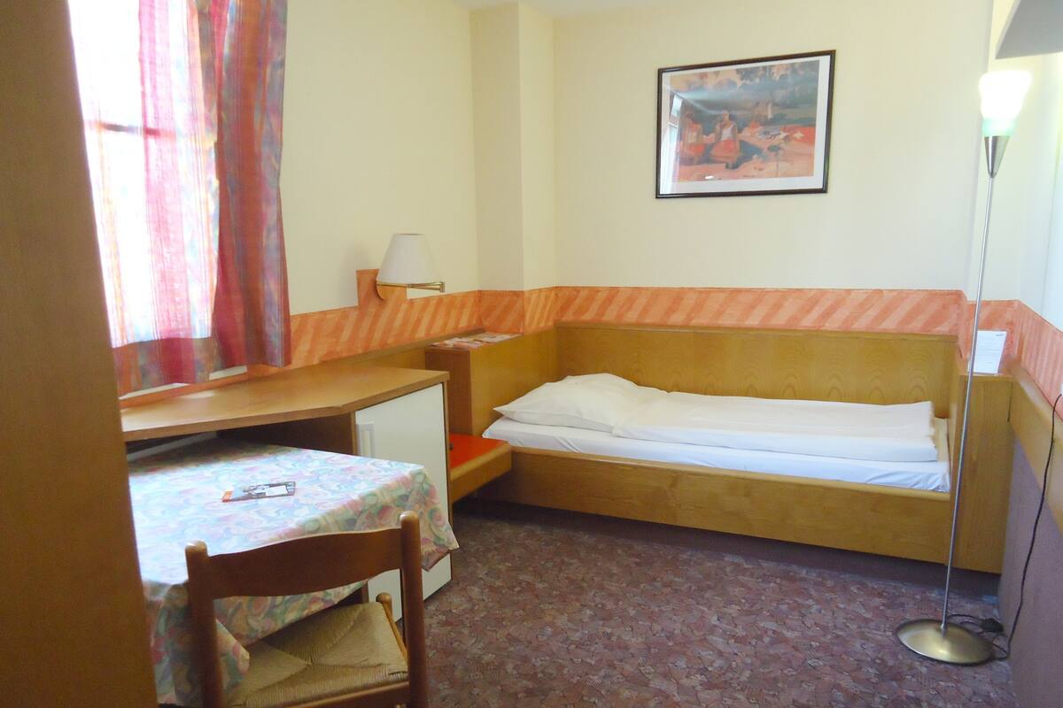 Basic Single Room, City View | Blackout drapes, soundproofing, iron/ironing board, WiFi